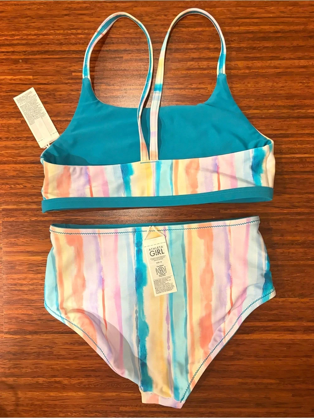 NWT Athleta Girl Reversible Pastel Watercolor Rainbow Bikini Size M/L